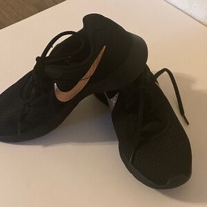 Nike Women's Black Sneakers with Bronze Swoosh